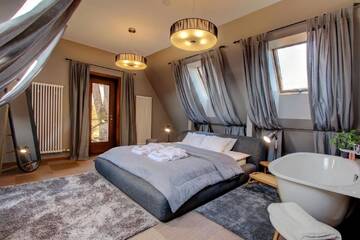 Фото Апартаменты Boutique Apartment Villa Rumba г. Кулдига 1