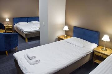 Фото номера Стандартный семейный номер Отель Comfort Hotel Kuldiga г. Кулдига 13