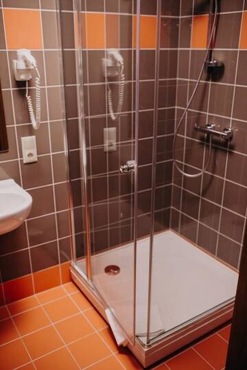 Фото номера Стандартный семейный номер Отель Comfort Hotel Kuldiga г. Кулдига 5
