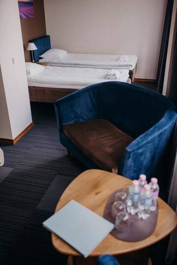 Фото номера Стандартный семейный номер Отель Comfort Hotel Kuldiga г. Кулдига 6