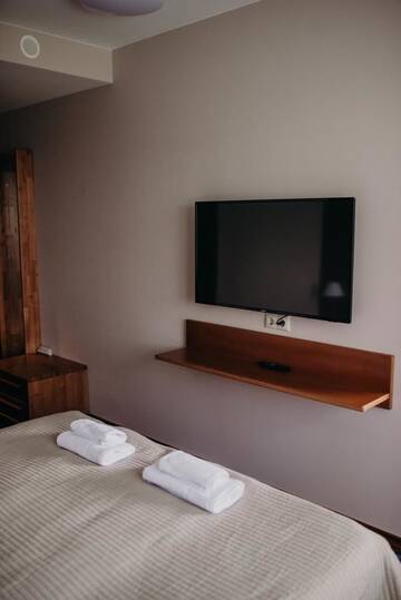 Фото номера Стандартный семейный номер Отель Comfort Hotel Kuldiga г. Кулдига 7