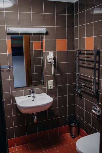 Фото номера Стандартный семейный номер Отель Comfort Hotel Kuldiga г. Кулдига 8