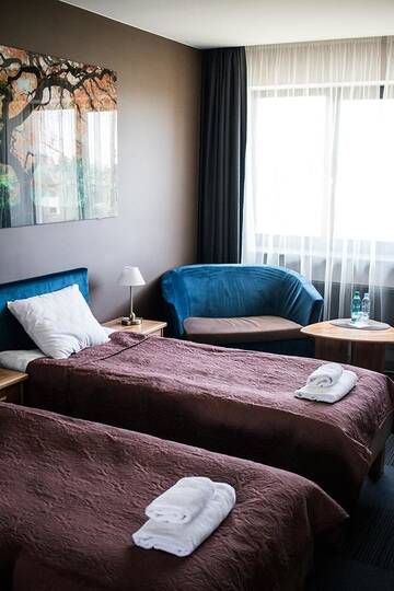 Фото номера Стандартный двухместный номер с 2 отдельными кроватями Отель Comfort Hotel Kuldiga г. Кулдига 7