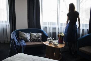 Фото номера Стандартный семейный номер Отель Comfort Hotel Kuldiga г. Кулдига 11