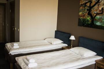 Фото номера Стандартный двухместный номер с 2 отдельными кроватями Отель Comfort Hotel Kuldiga г. Кулдига 5