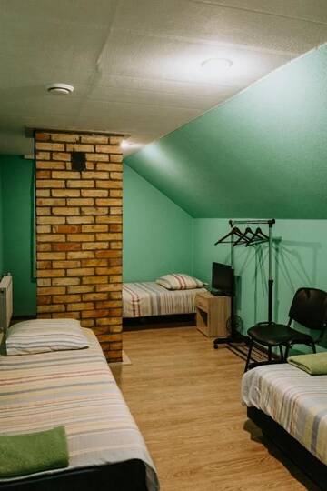 Фото номера Трехместный номер Гостевой дом Viesu nams Pupa г. Кулдига 6