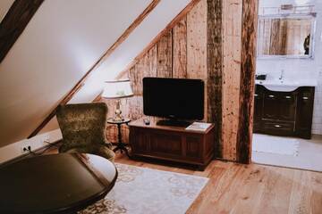 Фото номера Бутик-номер в мансарде Отель Boutique Hotel Virkas muiža г. Кулдига 12
