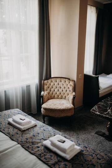 Фото номера Стандартный трехместный номер Отель Boutique Hotel Virkas muiža г. Кулдига 6
