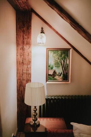 Фото номера Бутик-номер в мансарде Отель Boutique Hotel Virkas muiža г. Кулдига 20