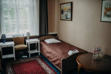 Фото номера Трехместный номер эконом-класса с общей ванной комнатой Отель Boutique Hotel Virkas muiža г. Кулдига 12