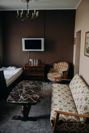 Фото номера Стандартный трехместный номер Отель Boutique Hotel Virkas muiža г. Кулдига 5