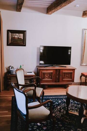 Фото номера Улучшенный двухместный номер с 1 кроватью Отель Boutique Hotel Virkas muiža г. Кулдига 13