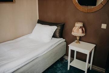 Фото номера Стандартный четырехместный номер Отель Boutique Hotel Virkas muiža г. Кулдига 4