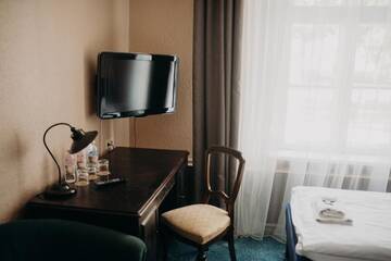 Фото номера Стандартный четырехместный номер Отель Boutique Hotel Virkas muiža г. Кулдига 9