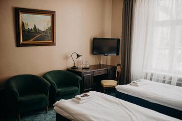 Фото номера Стандартный четырехместный номер Отель Boutique Hotel Virkas muiža г. Кулдига 12
