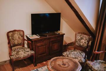 Фото номера Бутик-номер в мансарде Отель Boutique Hotel Virkas muiža г. Кулдига 7