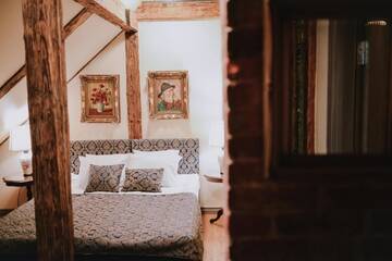 Фото номера Бутик-номер в мансарде Отель Boutique Hotel Virkas muiža г. Кулдига 5