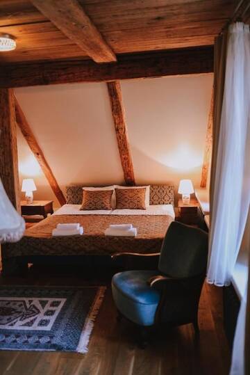 Фото номера Бутик-номер в мансарде Отель Boutique Hotel Virkas muiža г. Кулдига 2